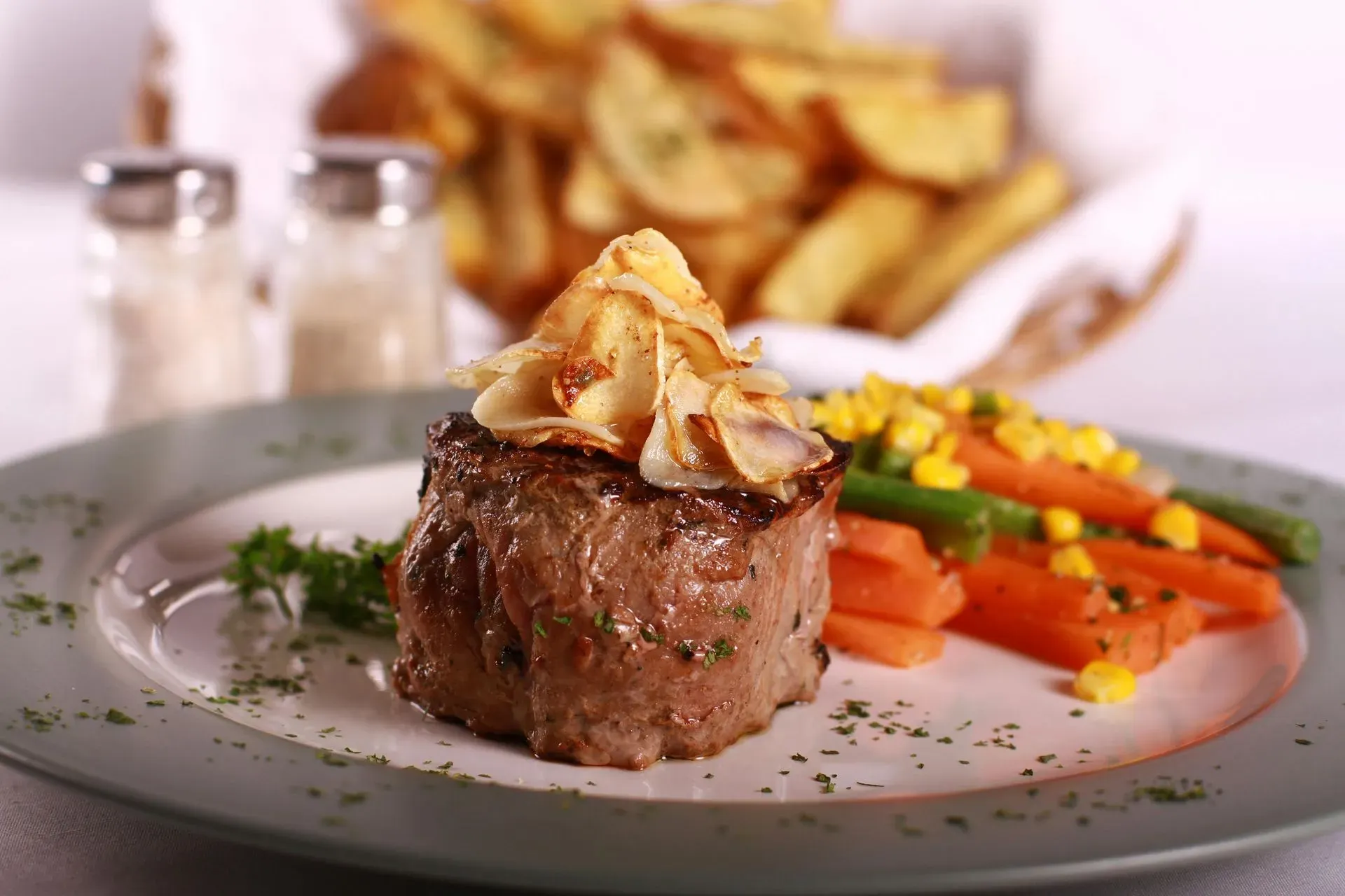 Plated steak with vegetables